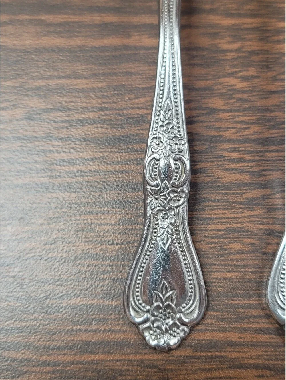 Vintage Stainless Steel Spoon and Fork Set with Ornate Floral Handles
